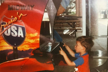 A young Mike playing Cruisin' USA, probably at the mall.